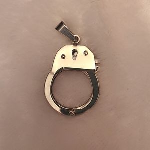 Tiny handcuff pendant